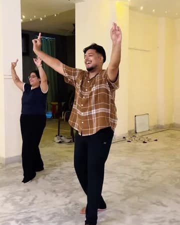A Bhangra class mid-move